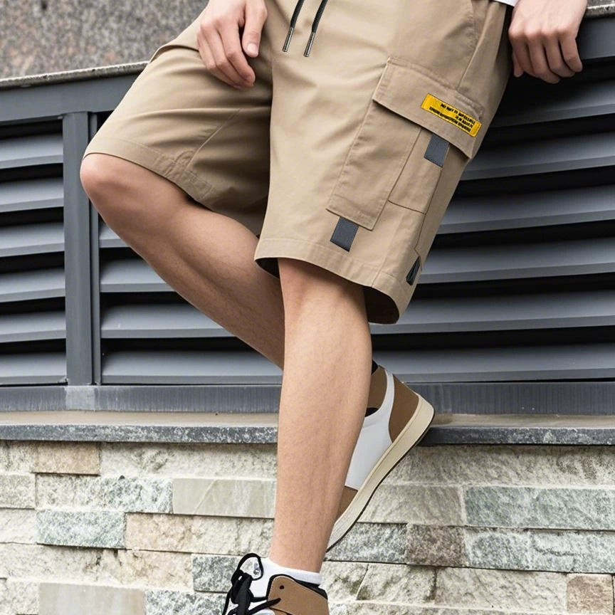 Stapel van de Reuben heren cargoshorts in alle beschikbare kleuren (grijs, zwart, khaki, army groen, donkerblauw), van bovenaf gezien.