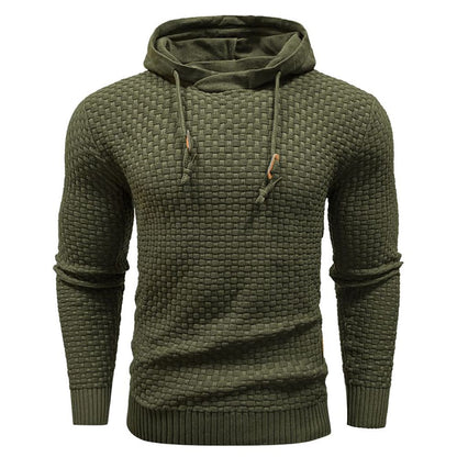 Legergroene hoodie, detail van de stof onder invloed van licht, laat de kwaliteit van de blend zien.