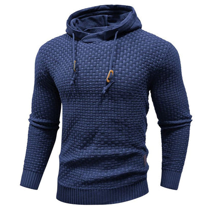Close-up van de textuur van de blauwe Siebe hoodie, met de fijne katoen-polyester mix goed zichtbaar en de stiksels.
