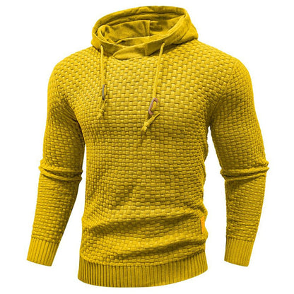 Donkergrijze hoodie, gedragen met een lichte spijkerbroek, een complete casual outfit met de hoodie.