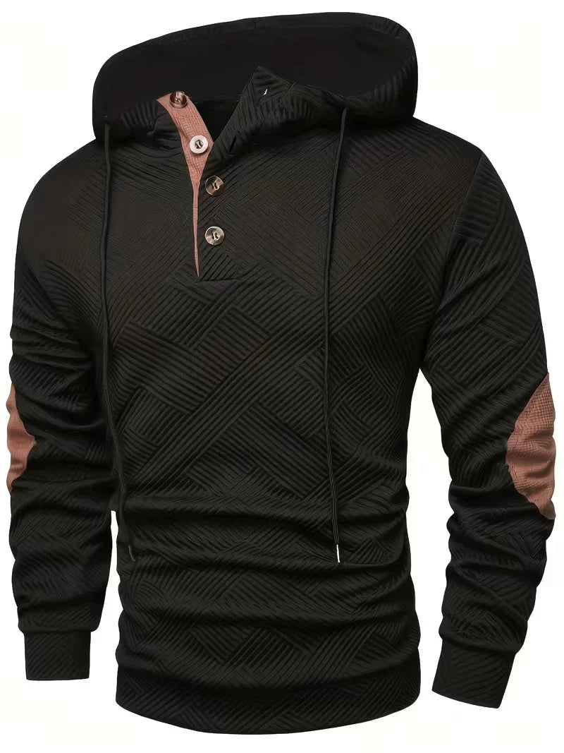 Zijaanzicht van de donkerblauwe Jesper hoodie, met focus op de geribbelde textuur en de versterkte elleboogstukken.