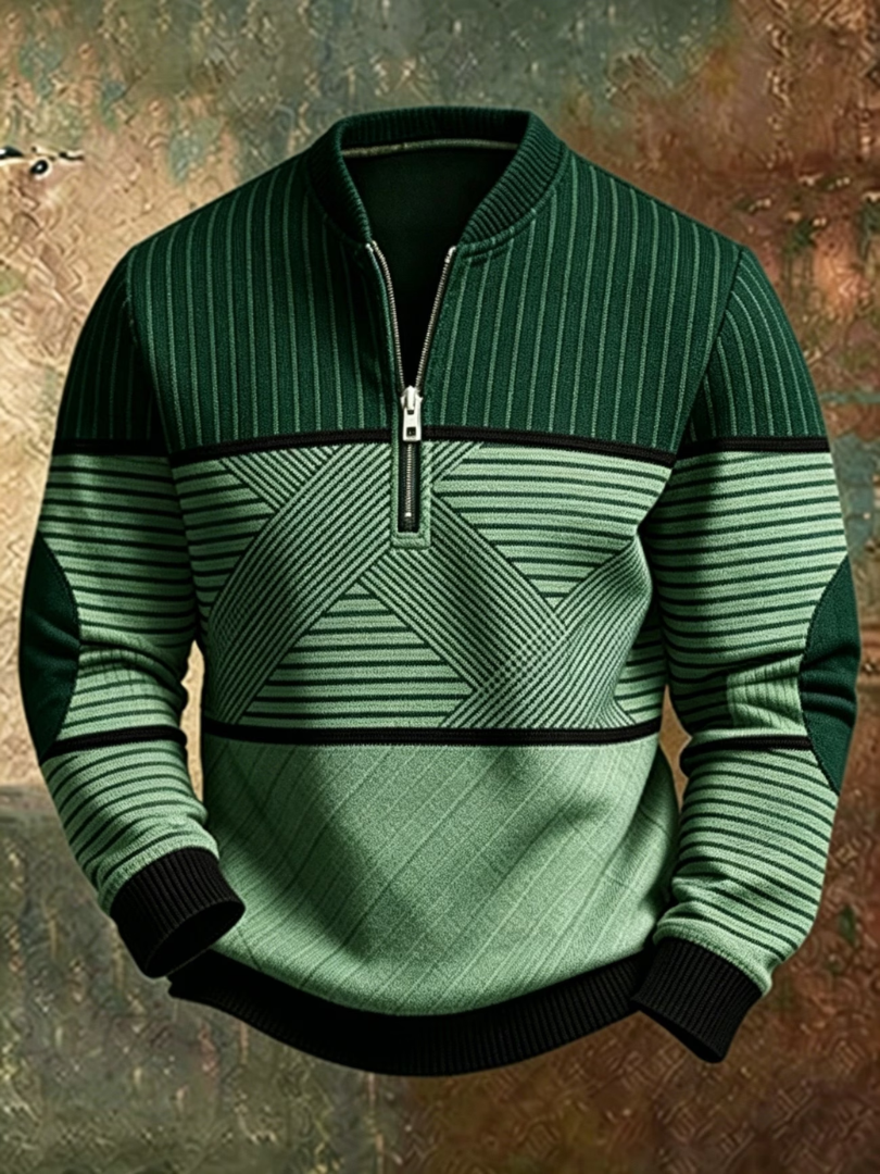 Close-up van de stofstructuur en de contrasterende lijnen van de groene heren sweater.