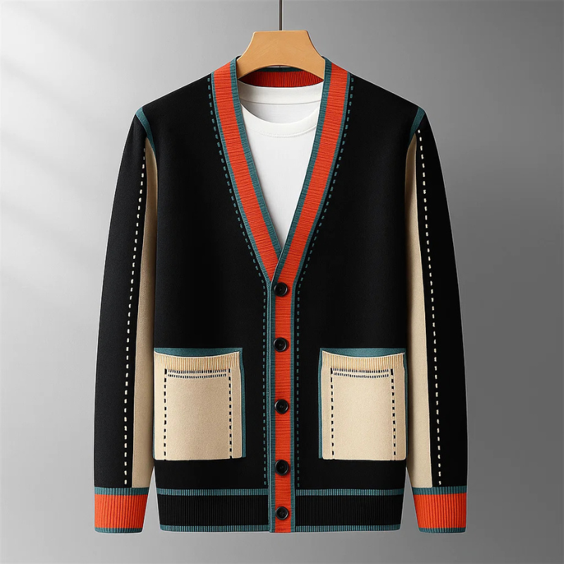 Close-up van de Casimir cardigan in zwart, toont de fijne wolblendtextuur en contrasterende biezen op de kraag.