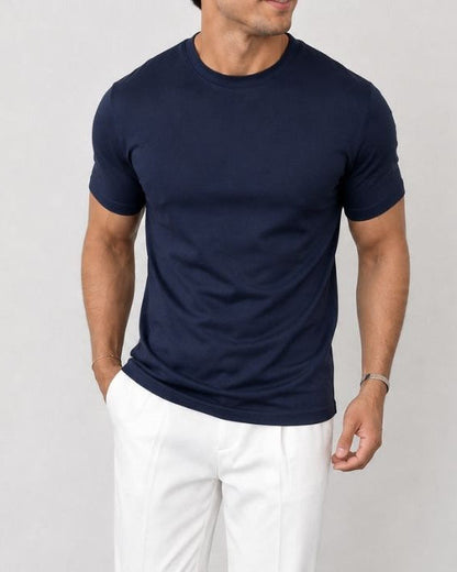 Assortiment van Frank Luxe Heren T-shirts in verschillende kleuren, netjes opgevouwen en klaar voor verzending.