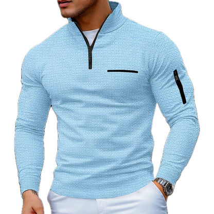Zijaanzicht van de comfortabele heren sweater in een donkere tint, met aandacht voor de pasvorm en mouwen.