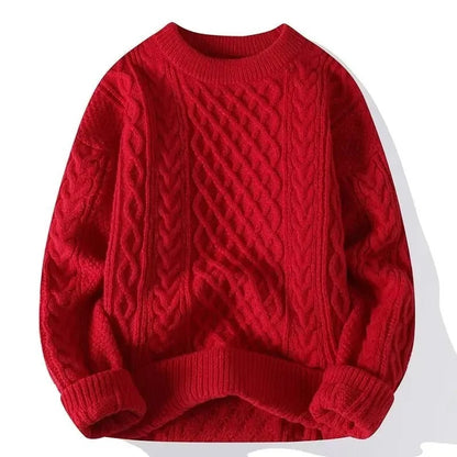Detailopname van de halslijn en ribboorden van de Elara kabelgebreide damestrui, wat het comfort benadrukt.