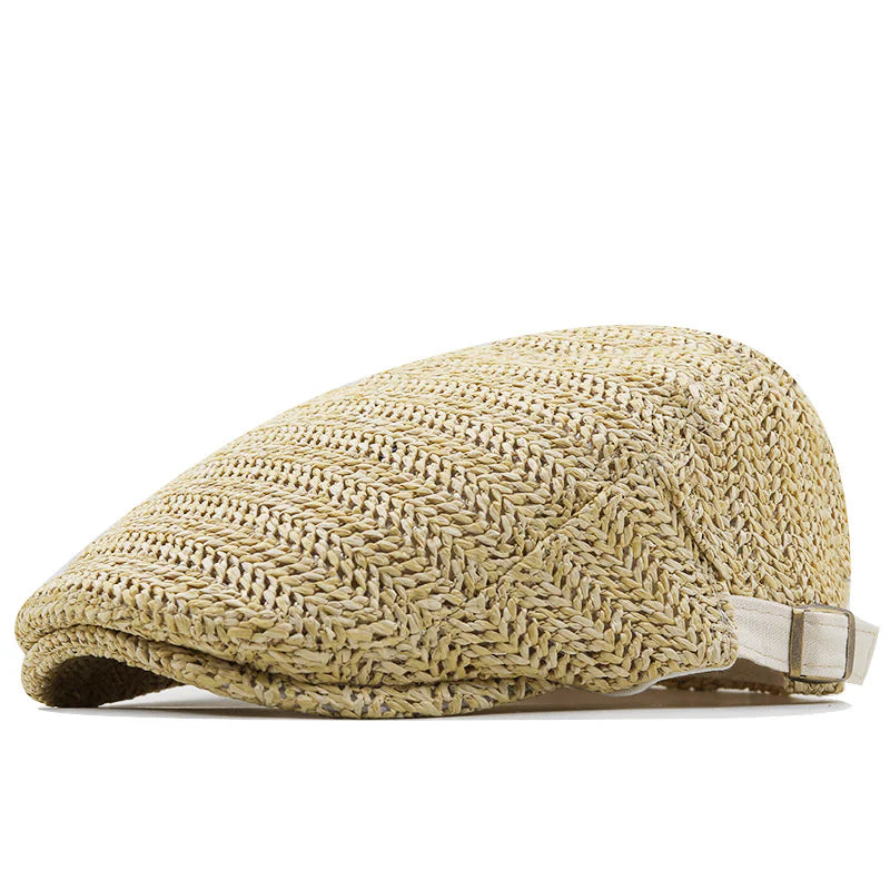 Achterkant van de Silas flatcap in beige, met de verstelbare riem en gesp als functioneel en stijlvol element.