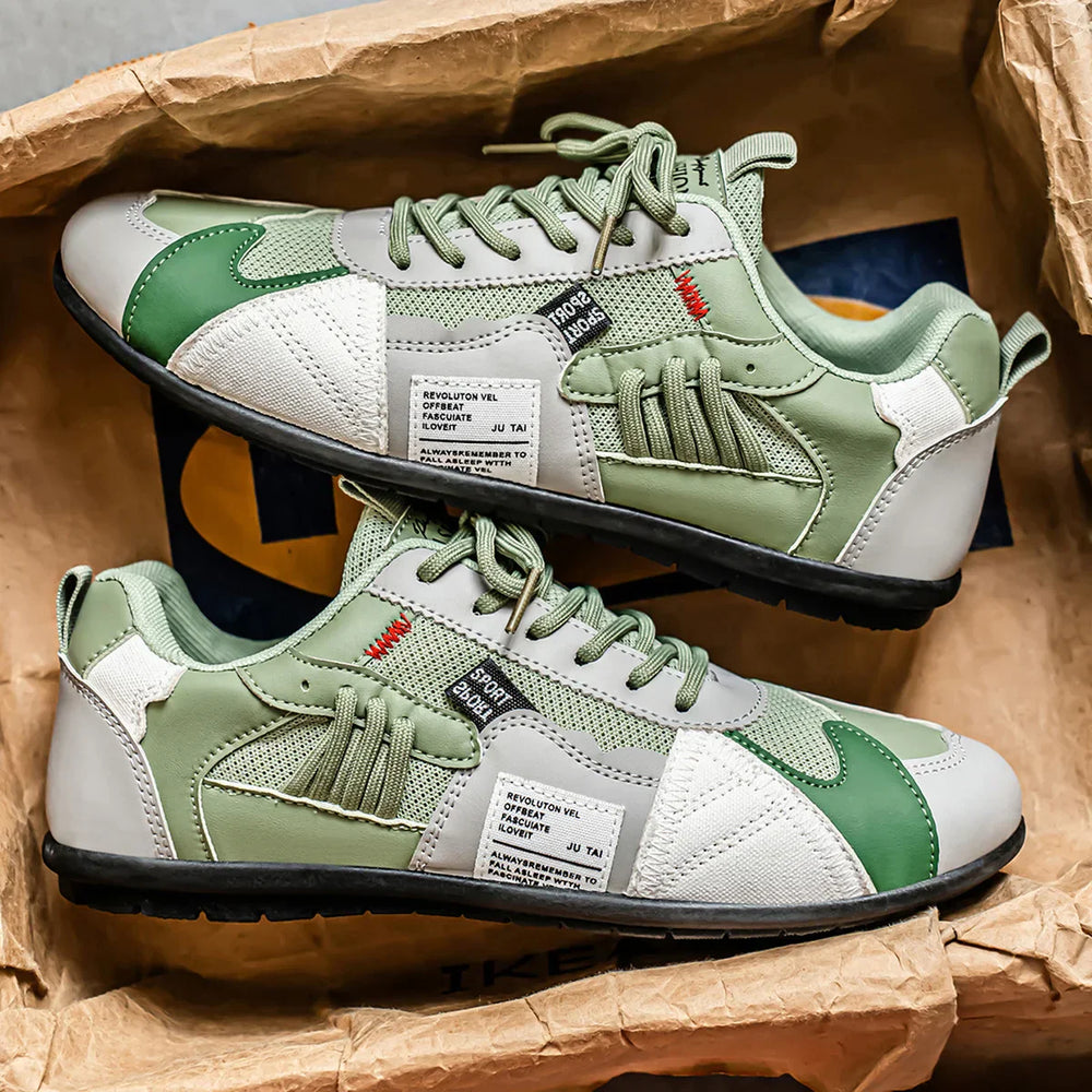 Detailopname van het ademende materiaal en de textuur van de trendy herenschoenen.