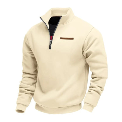 De veelzijdige sweater in een lichtere kleur, gedragen in een informele setting met een jeans.