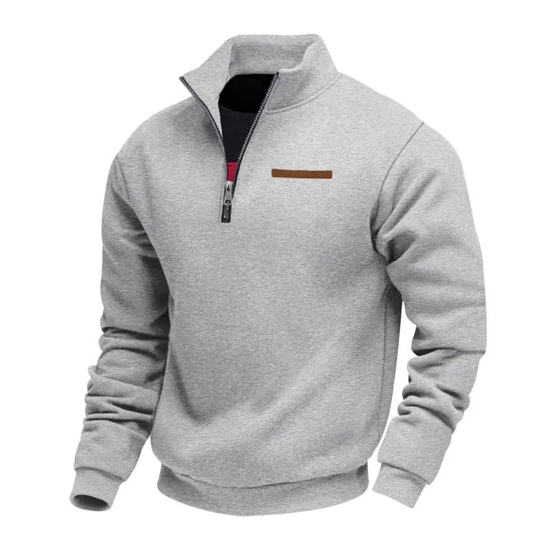 Zijaanzicht van de sweater, met focus op de opstaande kraag en de textuur van de katoenmix stof.