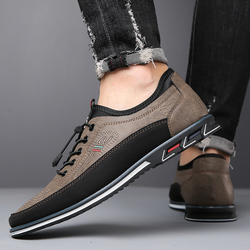 Een close-up van de stiksels en de afwerking rond de veters van een donkere vegan Oxford schoen.
