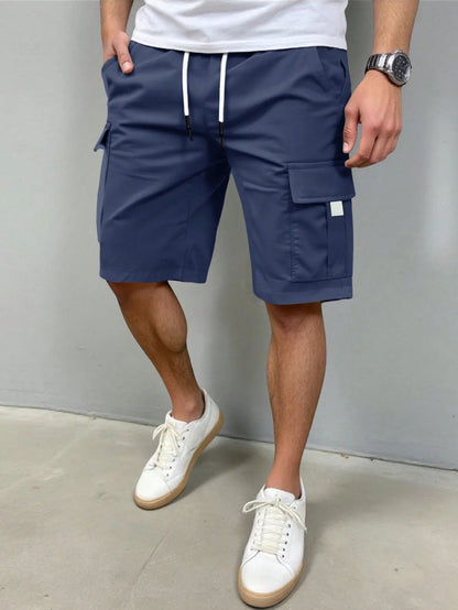 Close-up van de textuur van de stof van de grijze Lennart cargoshorts, met nadruk op de kwaliteit.