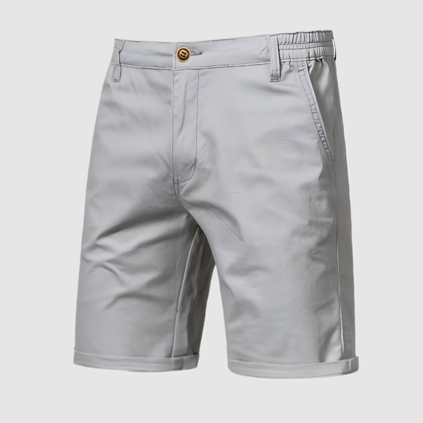 Close-up van de tailleband van de Loris katoenen shorts, met de stevige constructie en riemlussen.