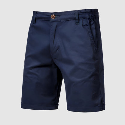 Detail van het label van de Loris herenshorts, met de merknaam en kwaliteitsindicatie.