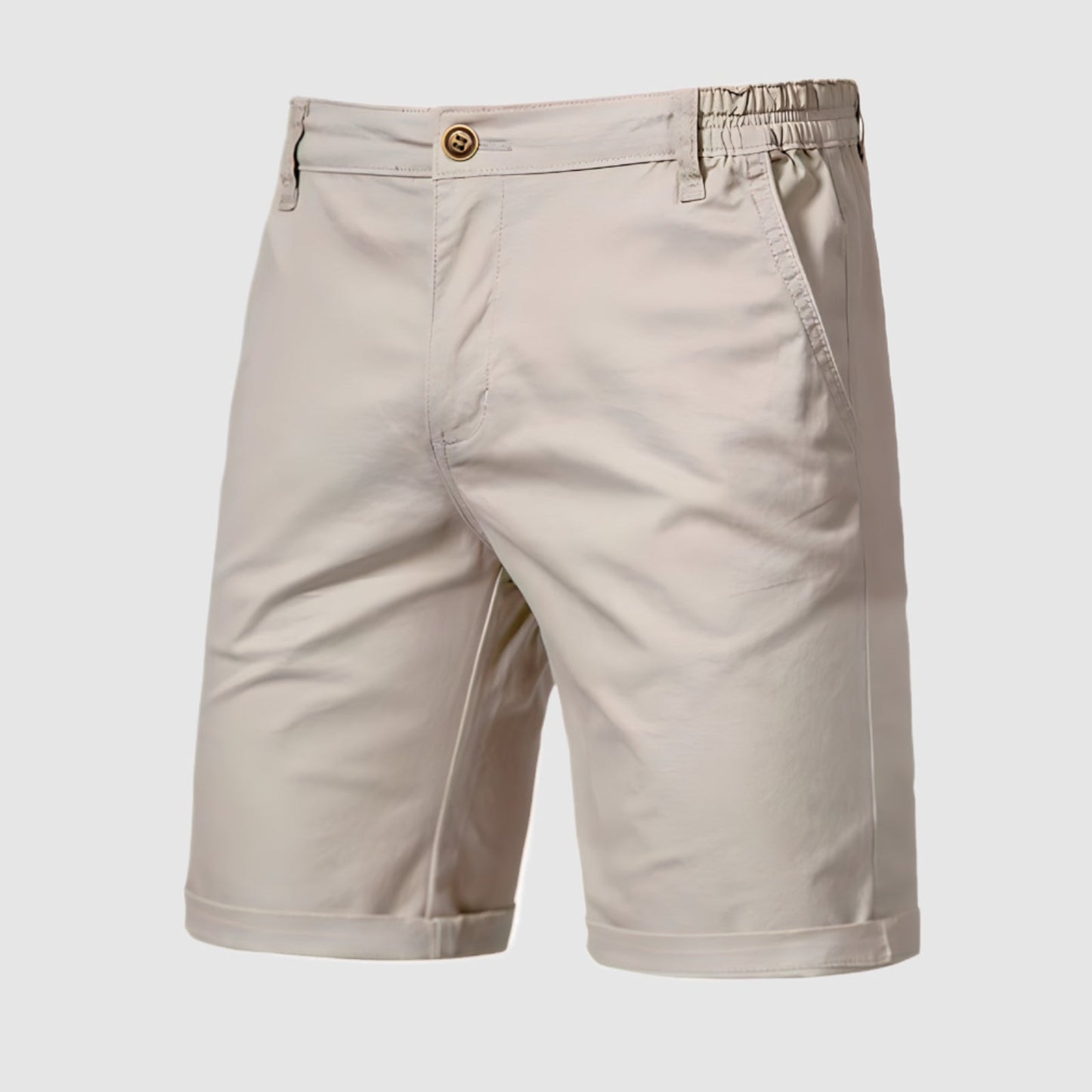 Stapel van verschillende kleuren Loris katoenen shorts, van licht naar donker, wat de veelzijdigheid benadrukt.
