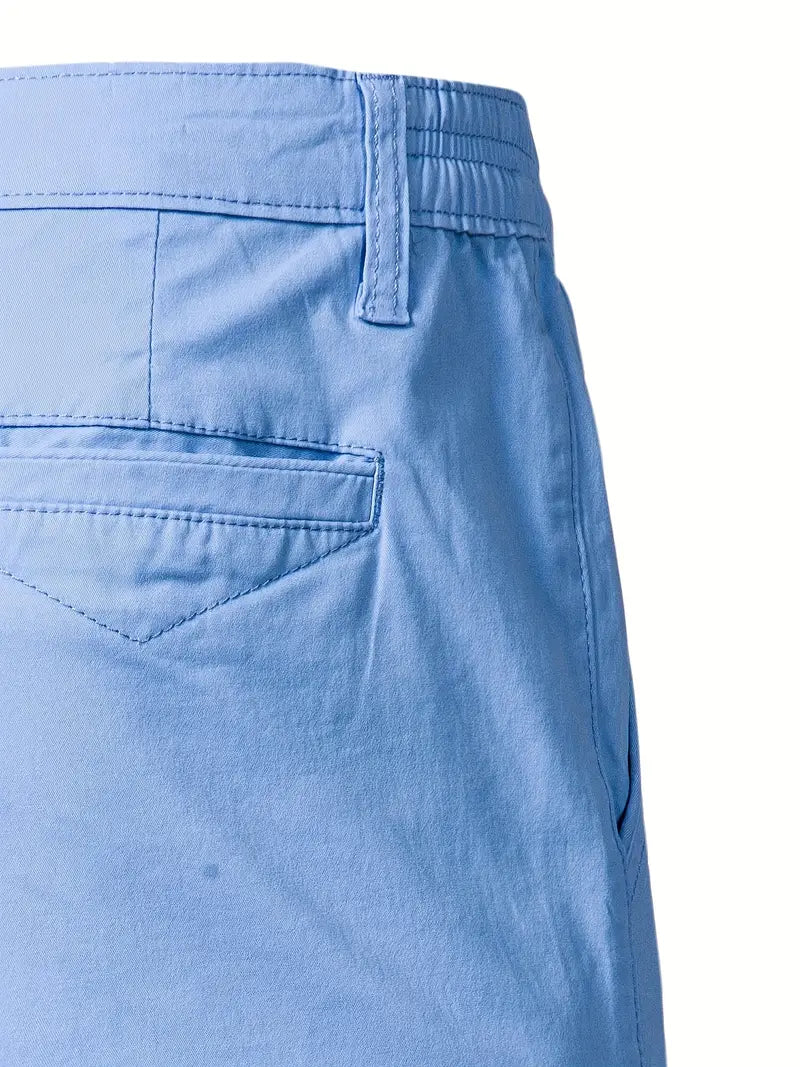 Bruine katoenen shorts, plat gelegd, toont de minimalistische ontwerpstijl.