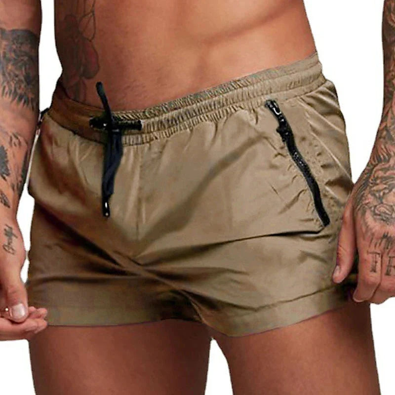 Detailopname van de tailleband van de Max zwemshort, toont de verstelbare trekkoord en de stevige afwerking van deze zwemshort.