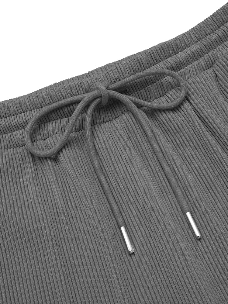 Detail van de stiksels langs de zijkant van het herenoverhemd in wit, bewijs van vakmanschap en duurzaamheid.