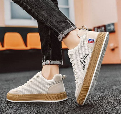 Zijaanzicht van een grijze Nils sneaker voor heren, comfortabel en orthopedisch ontworpen
