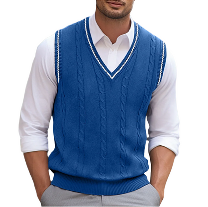 Detailopname van de V-hals en textuur van het Nils mouwloze vest in blauw.