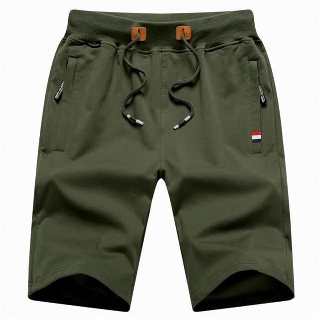 Close-up van de stof van de Quinn shorts in het wit, illustreert de zachtheid en het ademende karakter van de katoenmix.