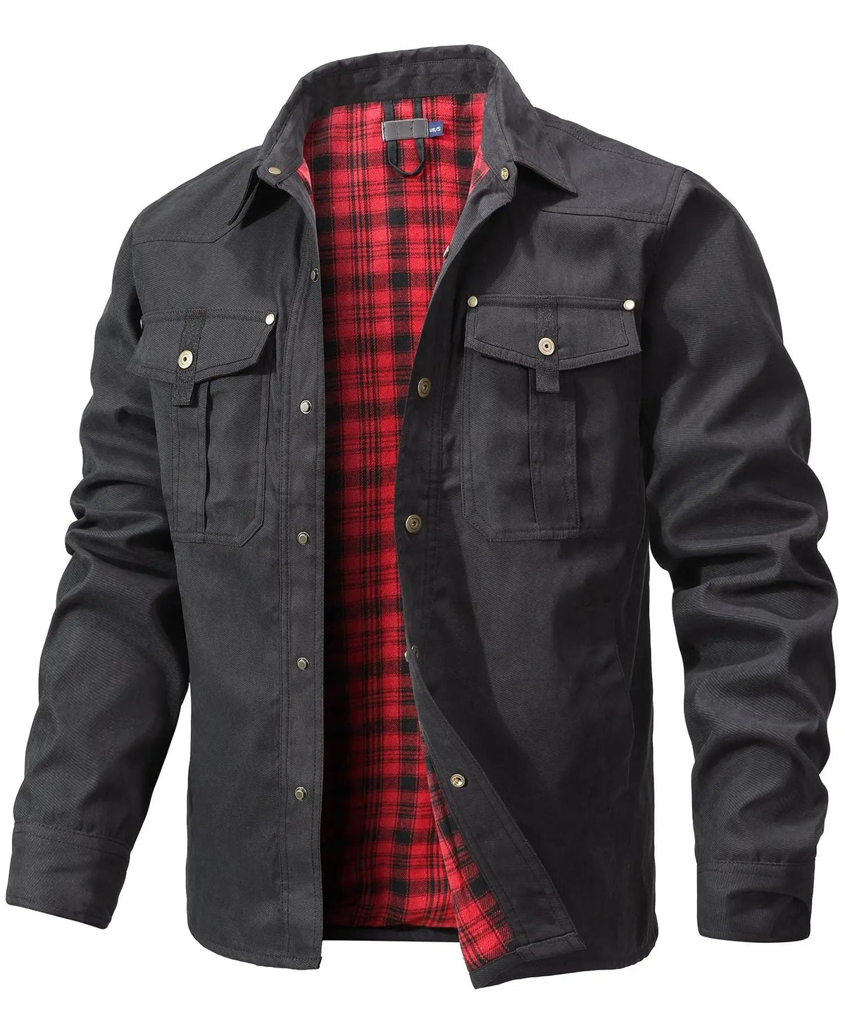 Man die de Rens herenjas in zwart combineert met denim, voor een robuuste en verfijnde uitstraling.