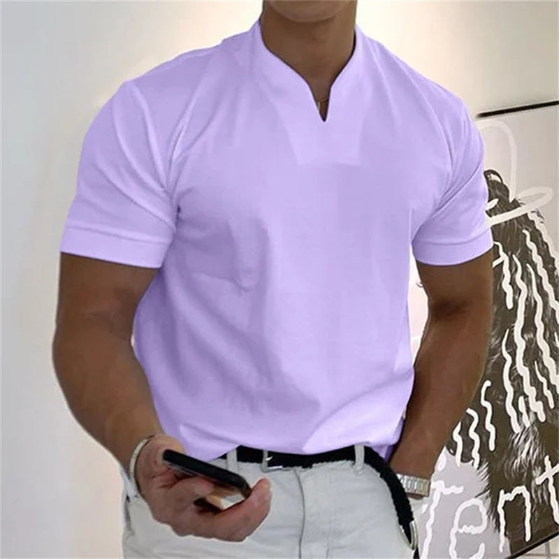 Collectie van Thymen Heren T-shirts in diverse effen kleuren, waaronder wit, blauw en grijs, op een rij.
