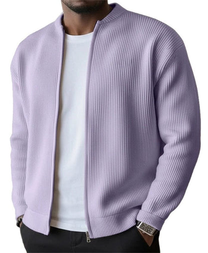 De gebreide jas met ritssluiting in diverse kleuren gepresenteerd, om de brede kleurkeuze voor de klant te illustreren.